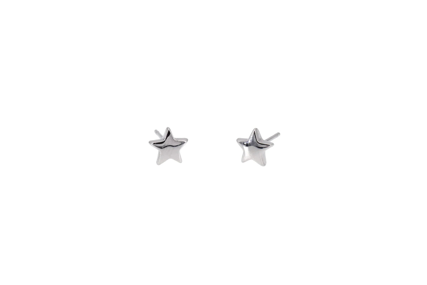 Silver star stud earrings on white background