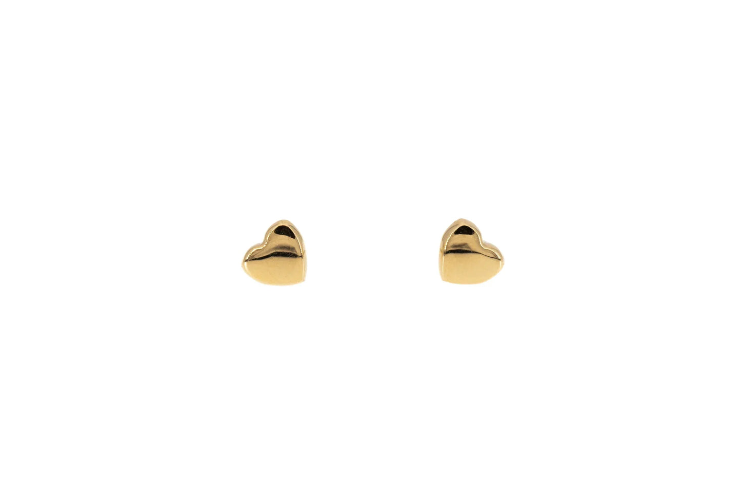 pair of small gold heart stud earrings on white background