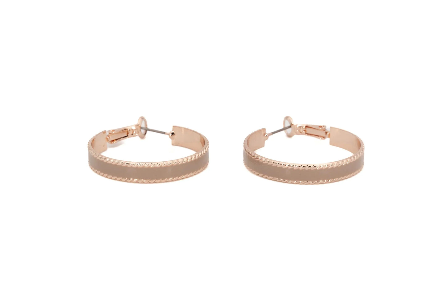 Rose gold hoop earrings with textured edges on white background