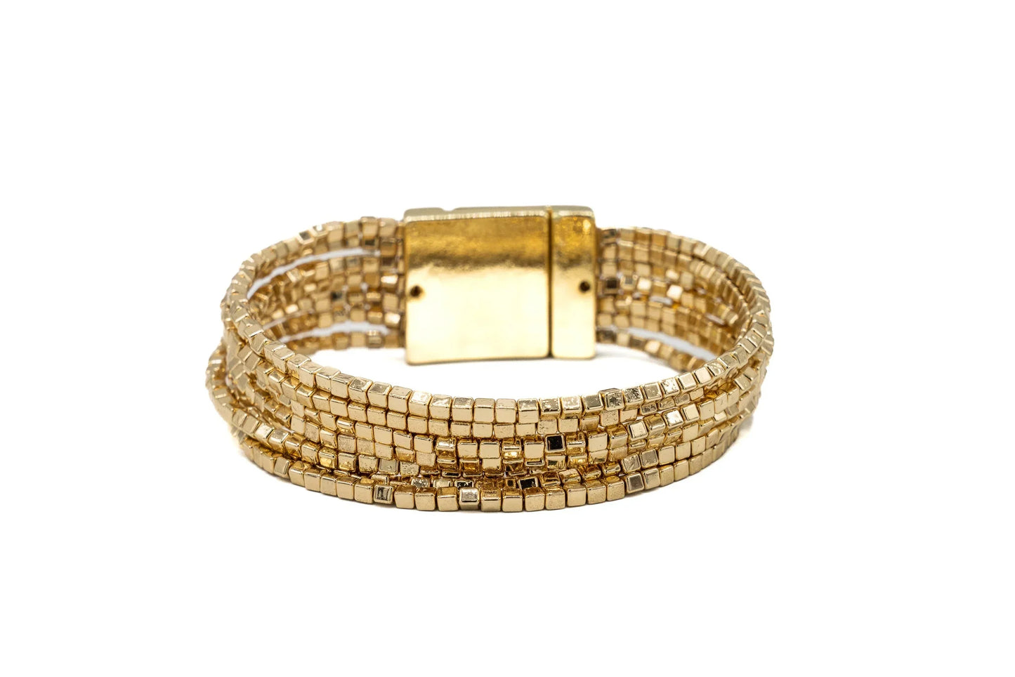 multi-strand gold beaded bracelet with metallic clasp on white background