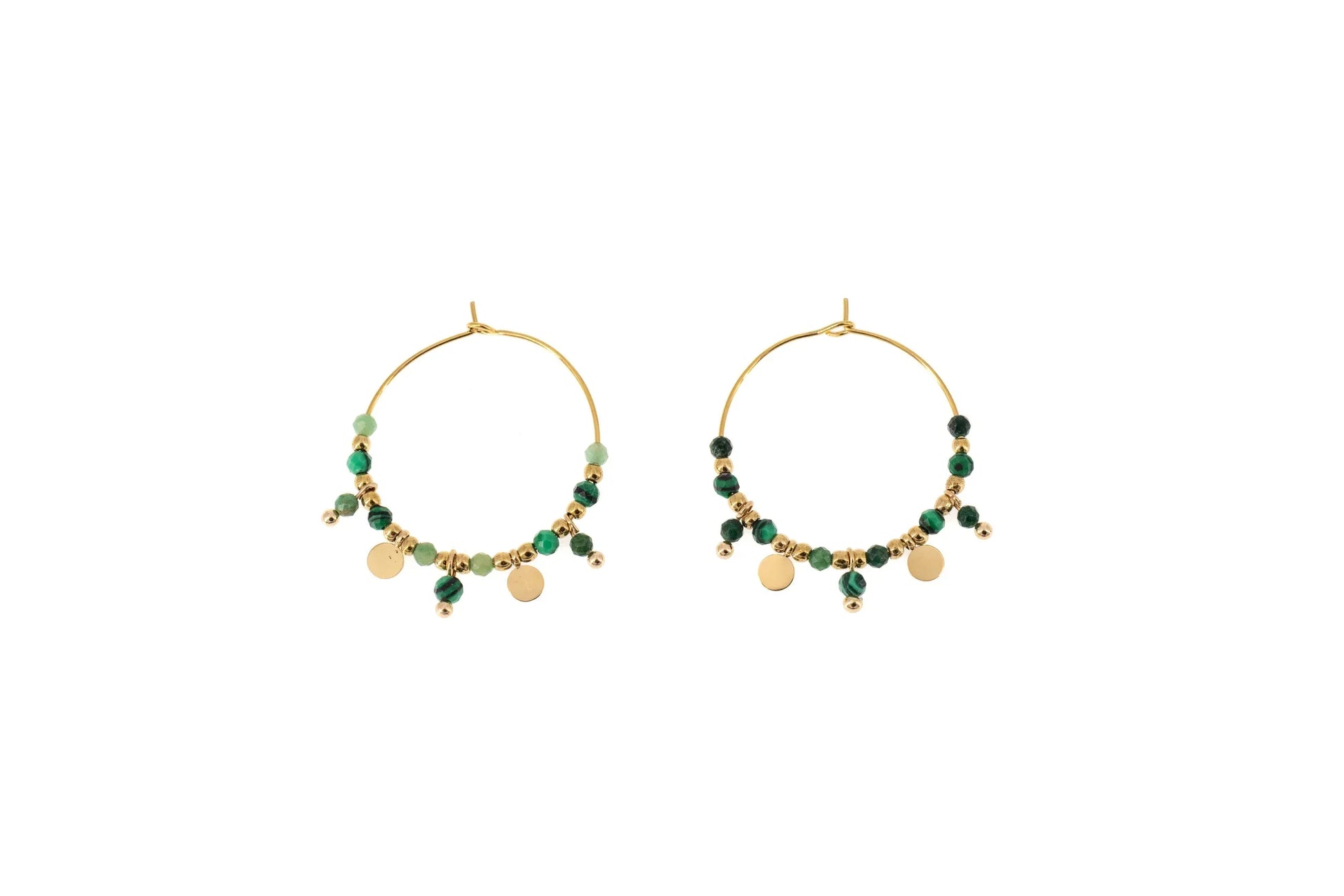 Gold hoop earrings with green beads and gold discs on white background