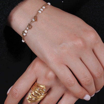 Bratara din otel cu perle albe si pandantive